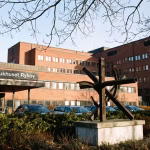 Sjuksköterska åtalas för våldtäkt mot döende patient